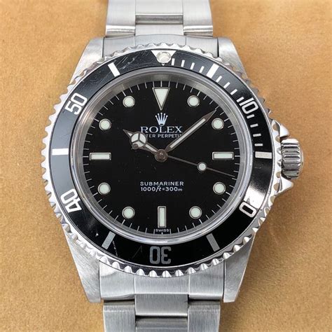 rolex submariner 14060m production numbers|rolex 14060 swiss only dial.